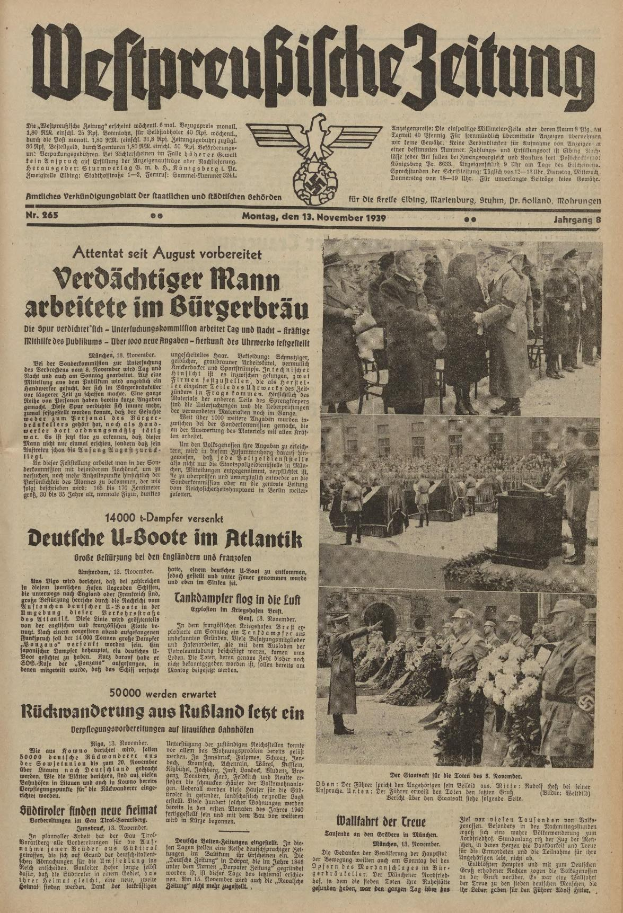 Schwarze-Weiß-Titelseite einer deutschen Zeitung vom 13. November 1939 mit der Überschrift "Weitpreubliche Zeitung", die eine Gruppe von Menschen in traditioneller deutscher Tracht in einer feierlichen Atmosphäre zeigt.