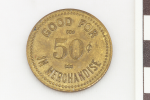 Eine Goldmünze mit der Aufschrift "Wertvoll für 50 in Waren" auf einem weißen Hintergrund.